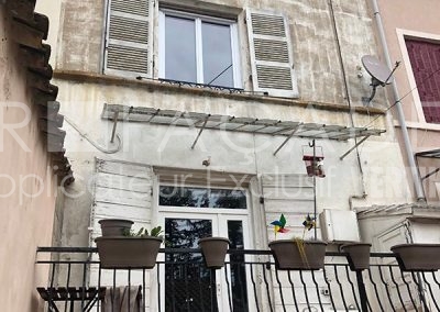 Façade 3R balcon plantes fenêtre